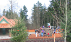 Cougar Park in Mill Creek with children in winter clothes on new playground equipment.